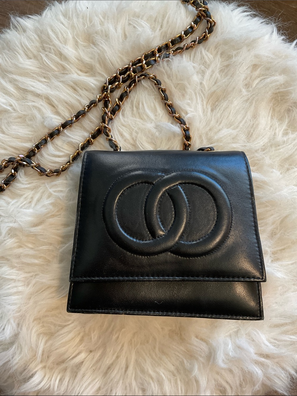 Black Leather Chain Crossbody Bag with Interlocking Circle Detail